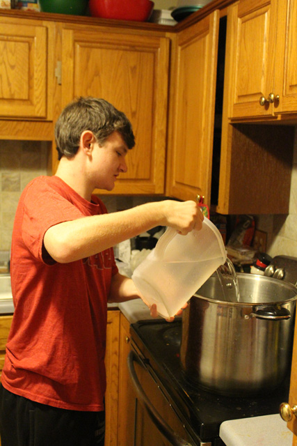 Caleb pouring strike water